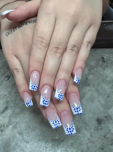Coffin nails with a blue leopard print French tip