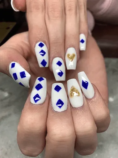 Red and white floral French tip on almond nails