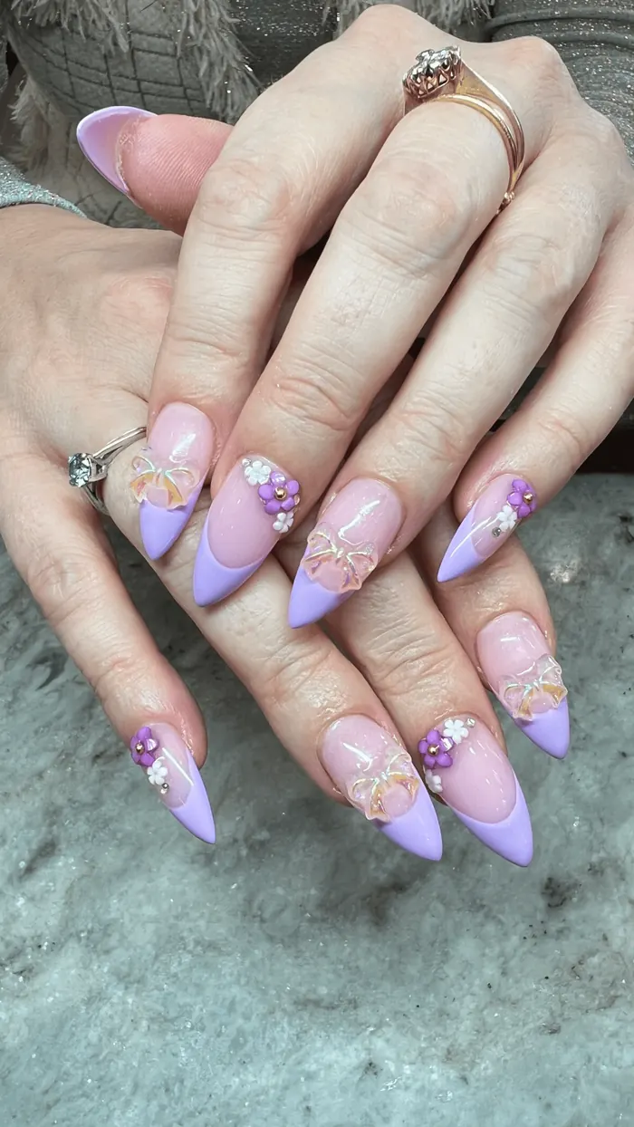 Long coffin nails with white polka dots over a nude base