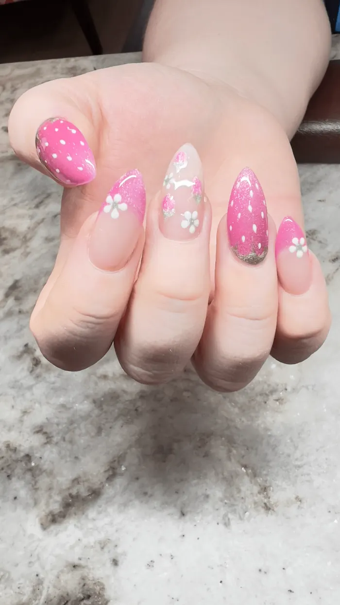 Iridescent white nails with crystal encrusted accent nails
