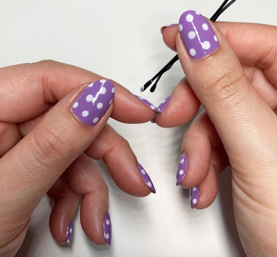 Purple polka dot nail art