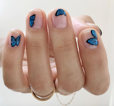 Blue butterfly nail art 