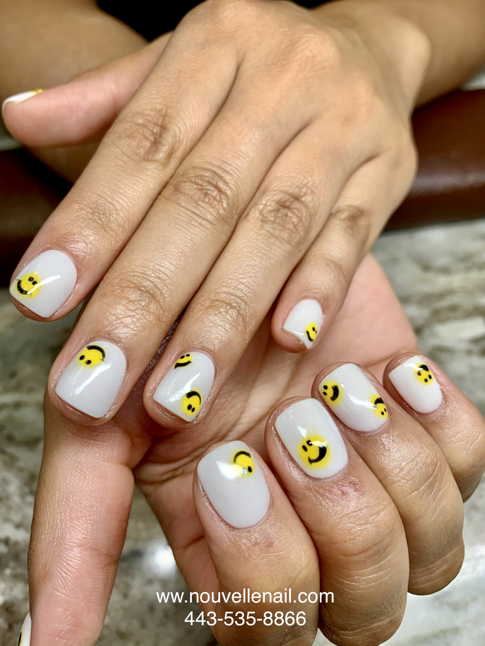 white dipping powder nails with smile face
