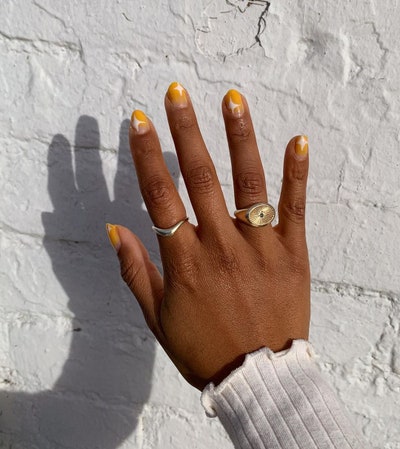 Yellow sparkle nail art 