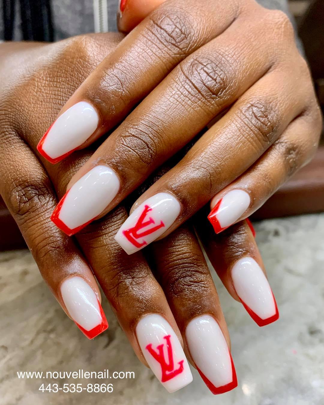 White coffin nails with LV logo designs