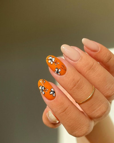 Orange floral nail art 