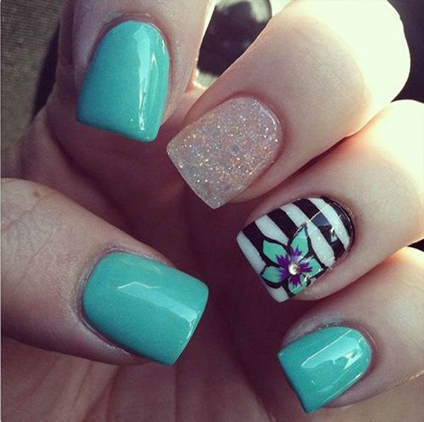 Sea Blue Strips and Flower Nail Design. 