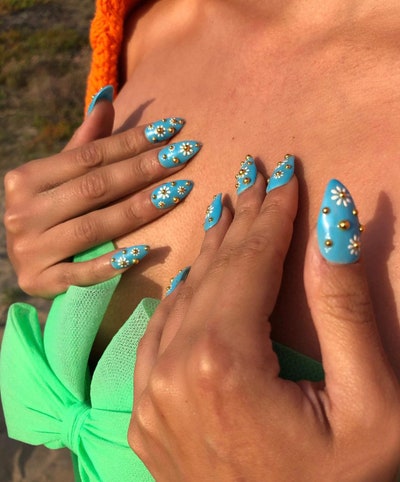 Blue studded nail art 